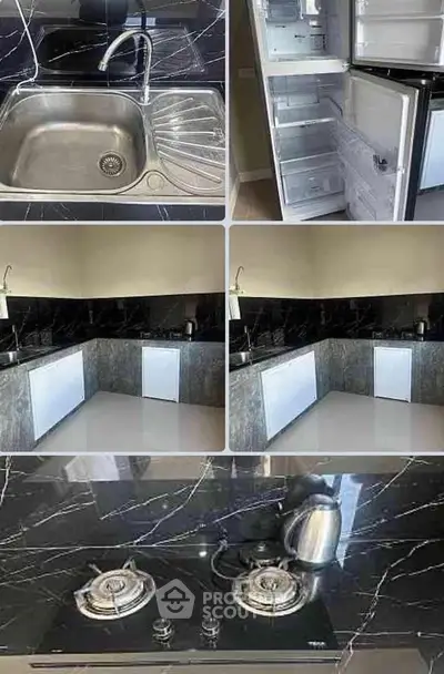 Modern kitchen with sleek black marble countertops and gas stove, featuring a spacious fridge and stainless steel sink.