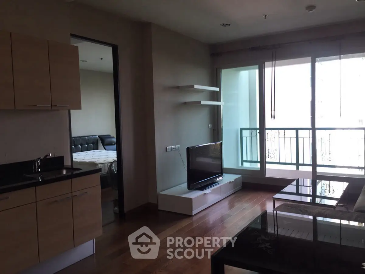 Modern apartment living room with balcony and sleek interior design