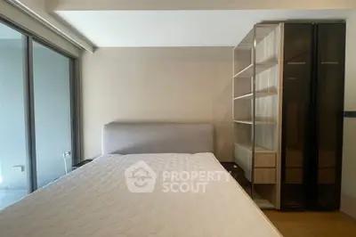 Modern bedroom with stylish decor and comfortable bedding