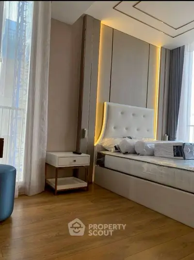 Luxurious modern bedroom with elegant lighting and stylish decor