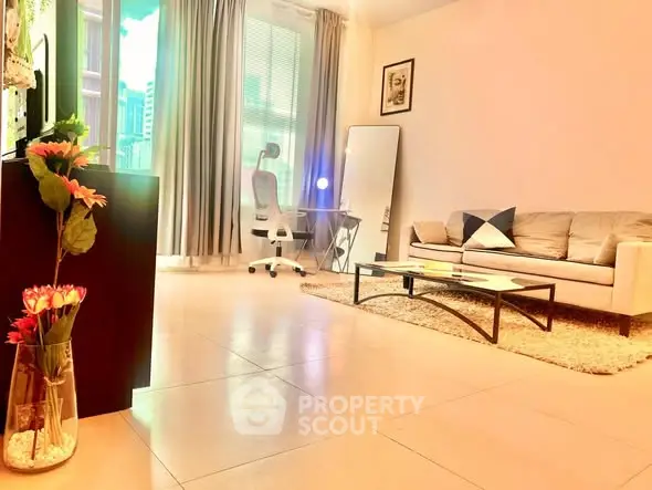 Spacious modern living room with elegant decor and large windows