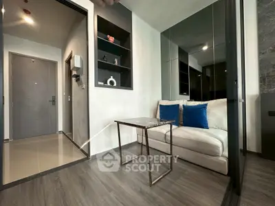 Modern living room with sleek design and cozy seating area