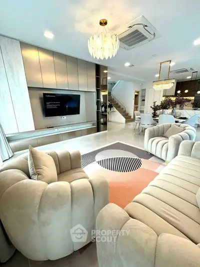 Luxurious modern living room with plush seating and elegant decor