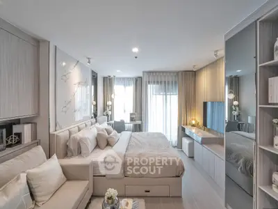 Luxurious modern bedroom with elegant decor and ample natural light