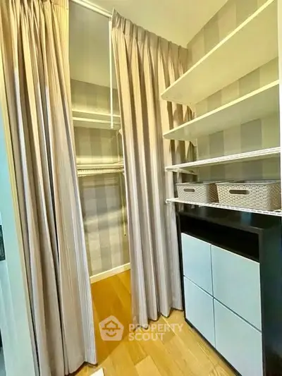 Spacious walk-in closet with elegant shelving and storage solutions