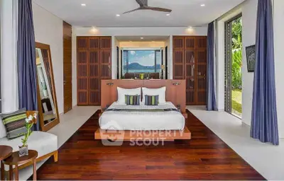 Luxurious bedroom with modern design and stunning garden view