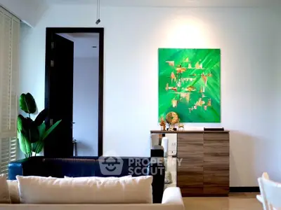 Stylish living room with modern art and sleek furniture