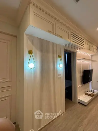 Stylish modern living room with elegant lighting and wall-mounted TV