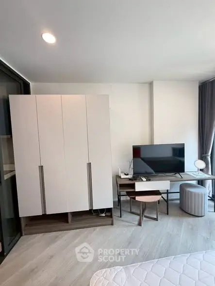 Modern living room with sleek furniture and natural light