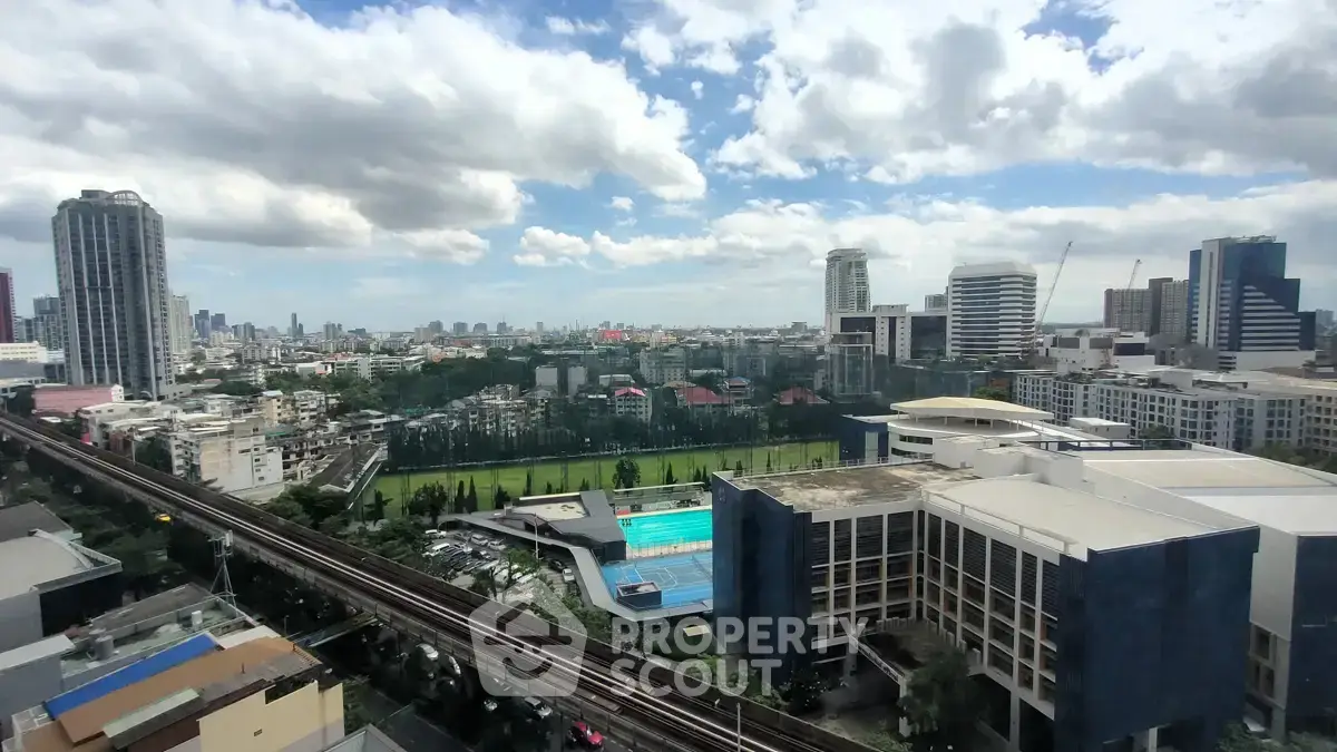 Stunning cityscape view with modern buildings and lush greenery, perfect for urban living enthusiasts.