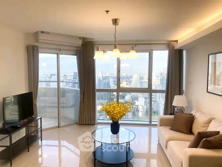Spacious living room with panoramic city view and elegant decor