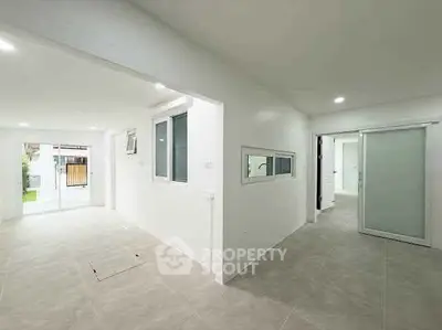 Spacious modern interior with open layout and large windows