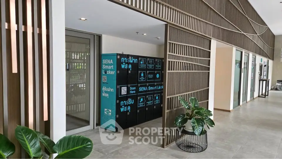 Modern apartment lobby with smart lockers and stylish decor