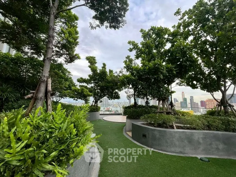 Lush rooftop garden with city skyline views and vibrant greenery.
