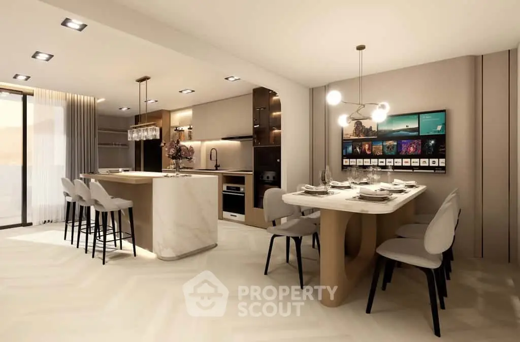 Luxurious modern kitchen with open layout and elegant dining area, featuring sleek appliances and stylish lighting.