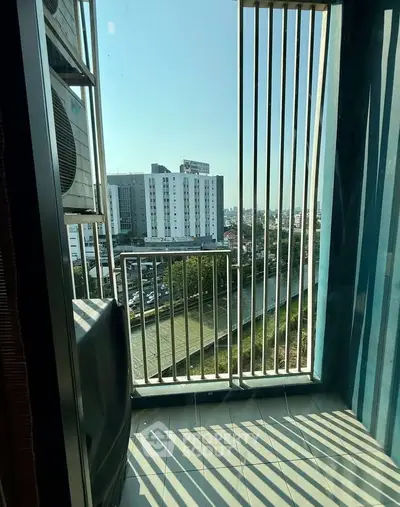 Charming balcony with city view and modern railing design, perfect for urban living.