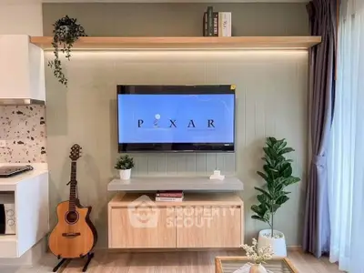 Stylish living room with modern decor, wall-mounted TV, and cozy ambiance.