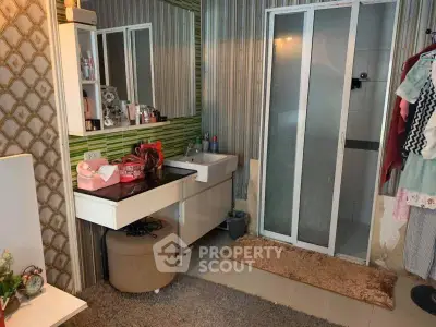 Charming bathroom with modern vanity and stylish decor