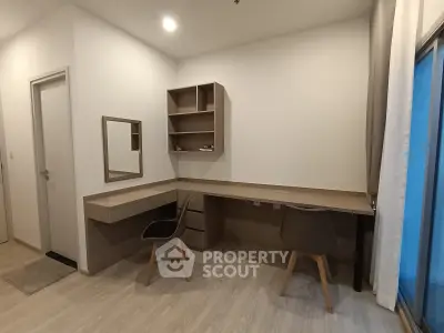 Modern study room with sleek wooden desks and chairs, ideal for productivity and comfort.