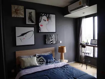 Stylish bedroom with modern decor and natural light, featuring a cozy bed and chic artwork.