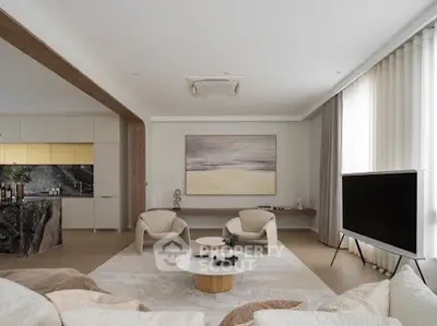 Luxurious modern living room with elegant decor and open kitchen layout