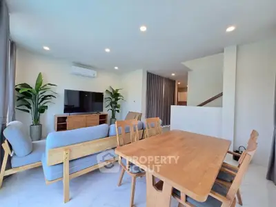 Spacious modern living room with stylish furniture and natural light