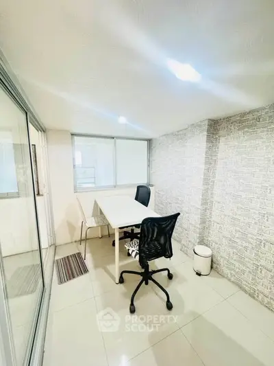 Modern study room with sleek design and ample natural light