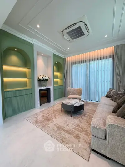 Elegant living room with modern decor, cozy sofa, and stylish lighting, perfect for relaxation and entertaining.