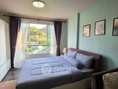 Cozy bedroom with scenic view, featuring a comfortable bed and elegant decor, perfect for relaxation.