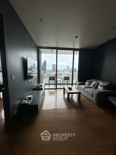 Modern living room with city view and sleek furniture