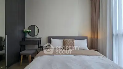 Cozy modern bedroom with elegant decor and natural light