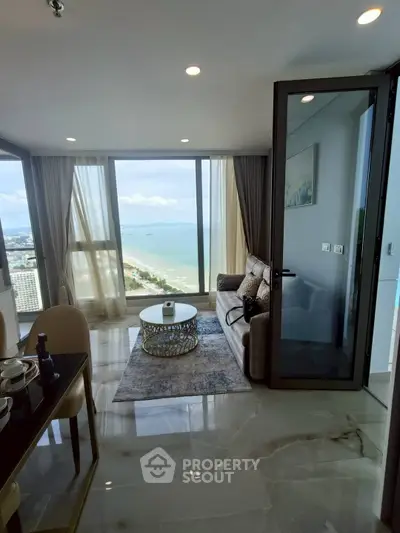 Luxurious living room with stunning ocean view and modern decor