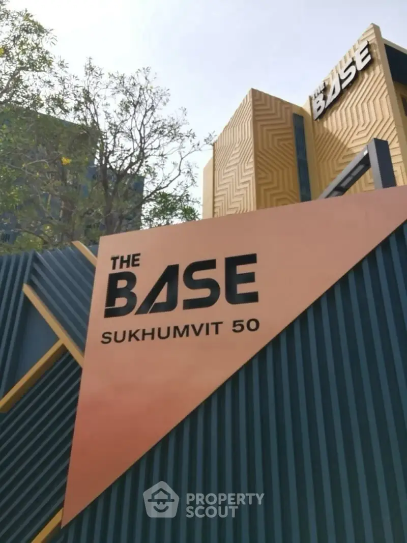 Modern architectural design of The Base Sukhumvit 50 building entrance.