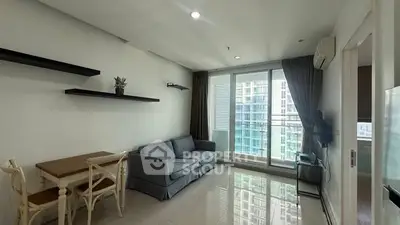 Modern living room with sleek design and city view balcony access.