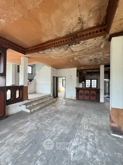 Spacious fixer-upper interior with potential for renovation and customization.