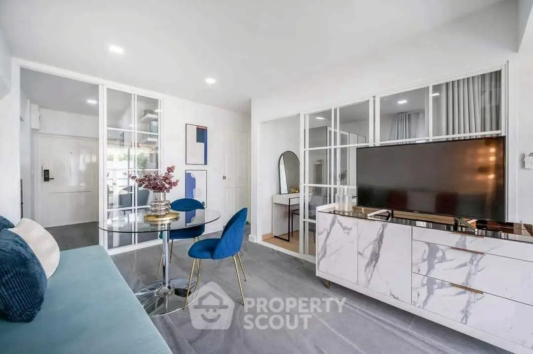 Modern living room with stylish decor and marble TV stand