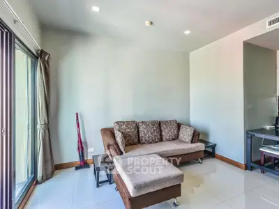 Modern living room with stylish sofa and natural light