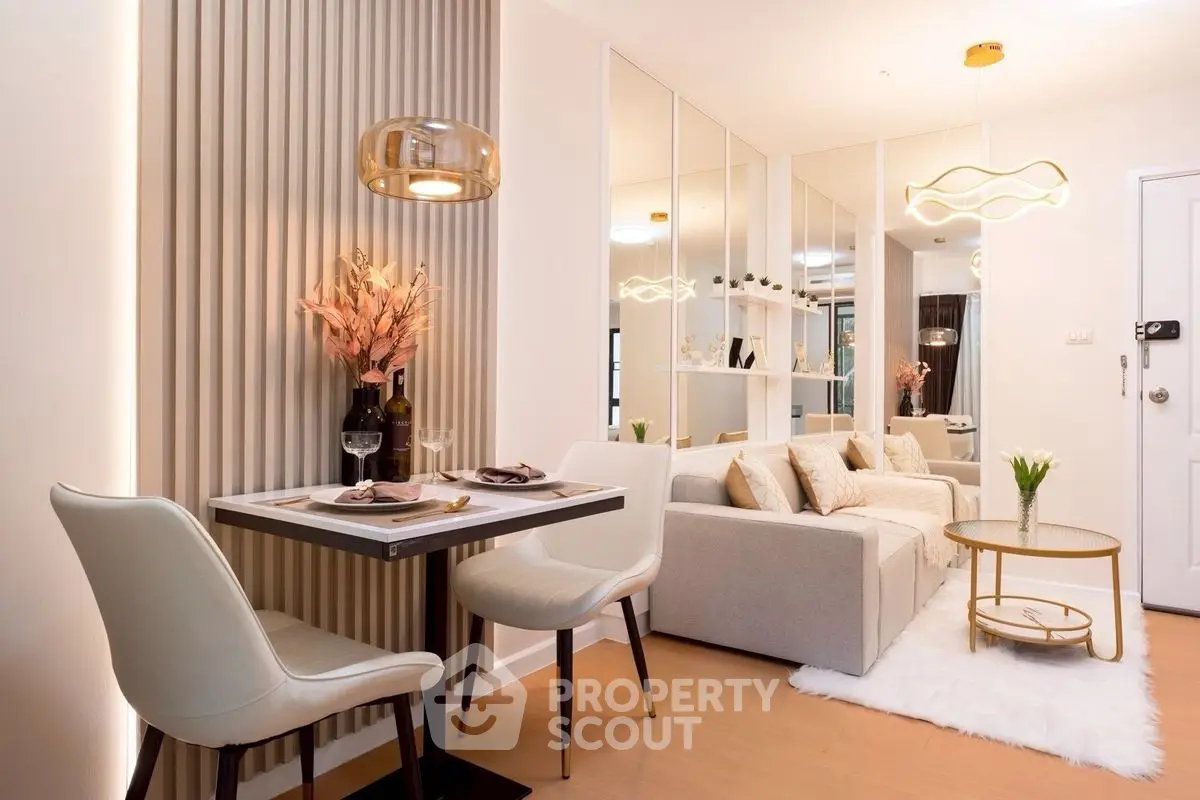 Modern living room with elegant decor and cozy seating area, perfect for relaxation and entertaining.