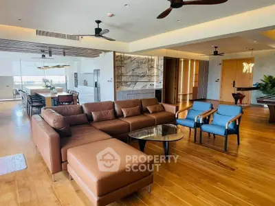 Spacious modern living room with elegant furniture and open layout