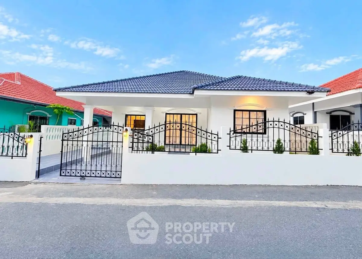 Charming single-story home with modern design and gated entrance in a serene neighborhood.