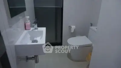 Modern bathroom with sleek fixtures and minimalist design