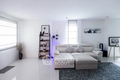 Modern living room with stylish decor and cozy seating area