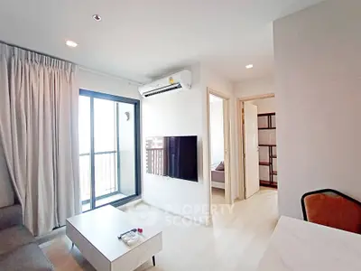 Modern living room with balcony access and sleek interior design