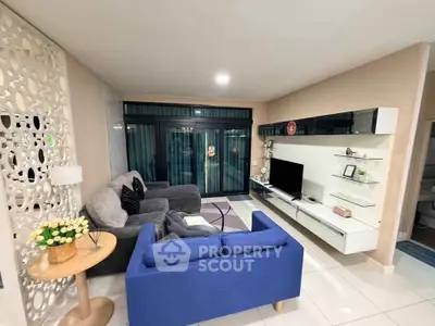 Modern living room with stylish decor and cozy seating area