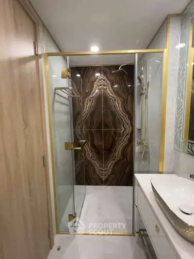 Luxurious bathroom with elegant glass shower and modern fixtures