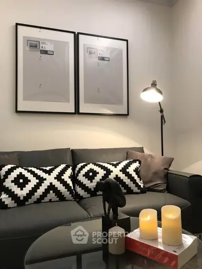 Stylish living room with modern decor, cozy sofa, and ambient lighting for a chic urban lifestyle.