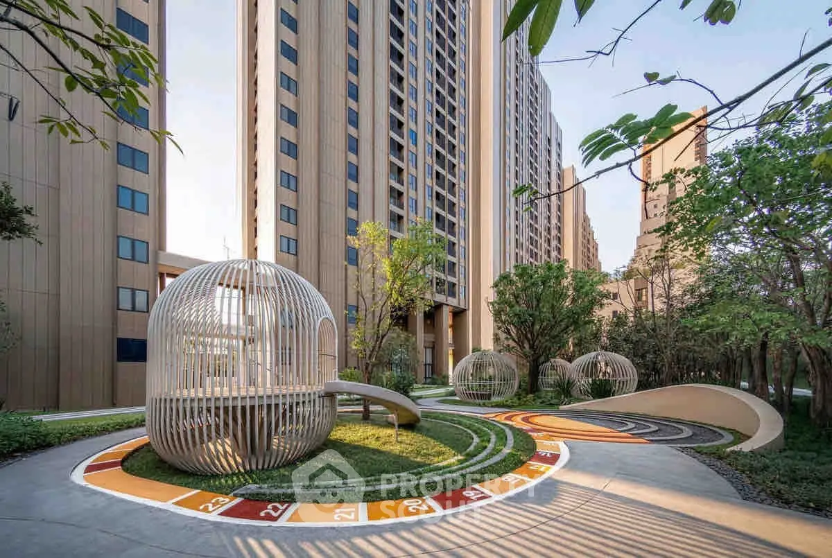 Modern residential complex with unique outdoor playground and lush greenery.