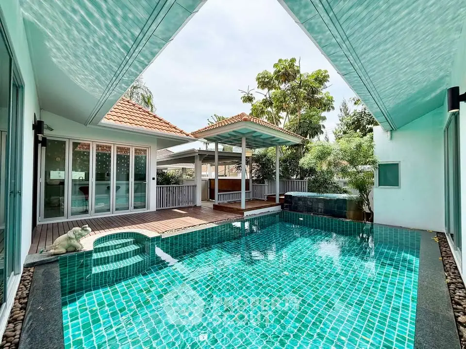 Stunning villa with private pool and lush garden, perfect for luxury living.