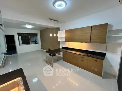 Modern kitchen with sleek cabinetry and open layout design