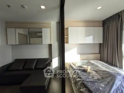 Modern bedroom with sleek design and ample natural light